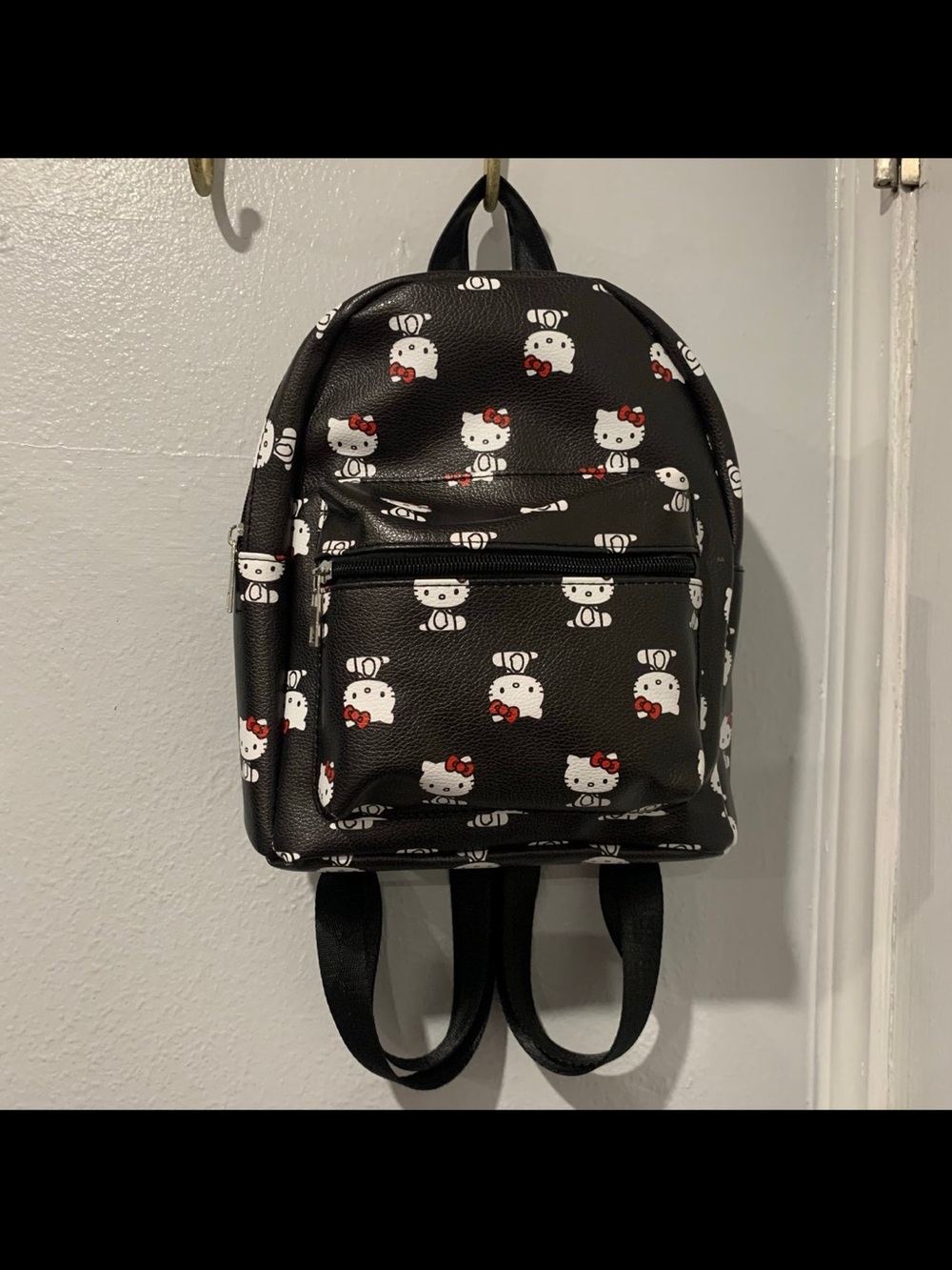 Hello Kitty Black Mini Backpack with White Character Print and Red Bows